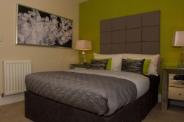 Bett Homes Photography - Green Bed Room